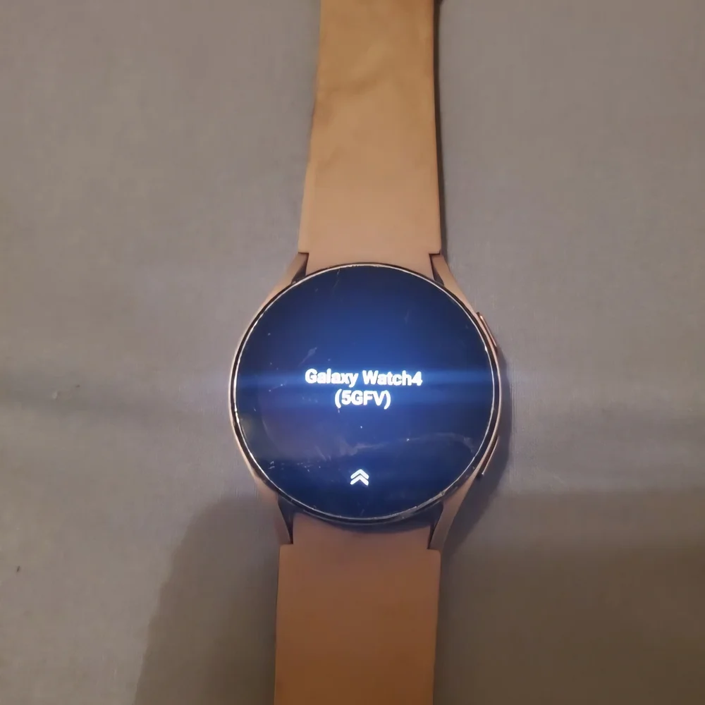 Samsung Smartwatch with Silver Bezel and Cream Band